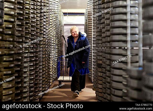 RUSSIA, MOSCOW REGION - MARCH 15, 2023: A woman manages a triacetate film vault on the premises of Gosfilmofond, the state-run film archive