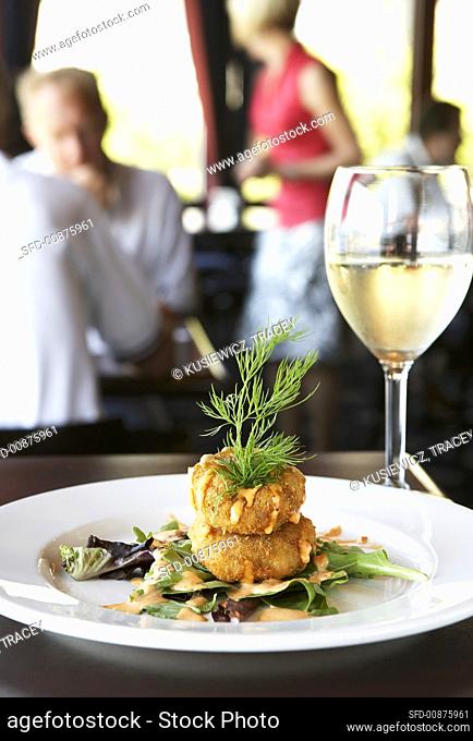 Crab cakes with cocktail sauce