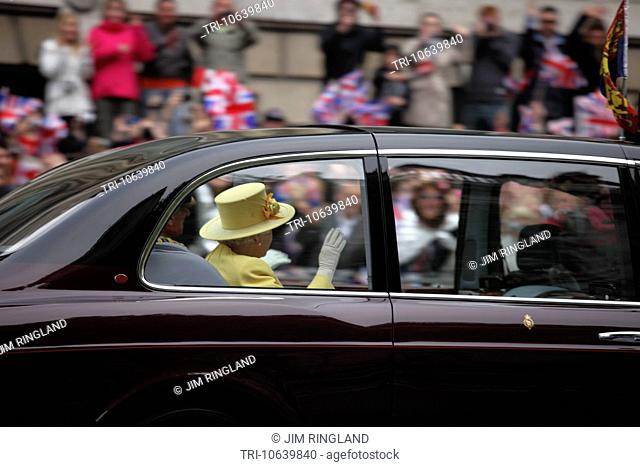 HM Queen Elisabeth 2nd of England and the Duke of Edinburgh being driven, on Parliament Street, London, England to the Royal Wedding of Prince William and Kate...