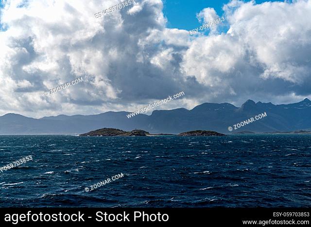 The Atlantic Ocean with Hjertholmen Island and the Lofoten Islands of northern Norway