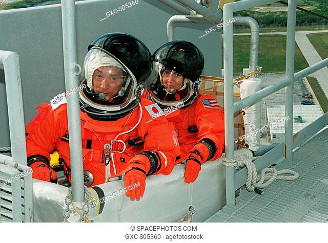 01/14/2000 -- At Launch Pad 39A, STS-99 Mission Specialists Mamoru Mohri Ph.D., who is with the National Space Development Agency NASDA of Japan