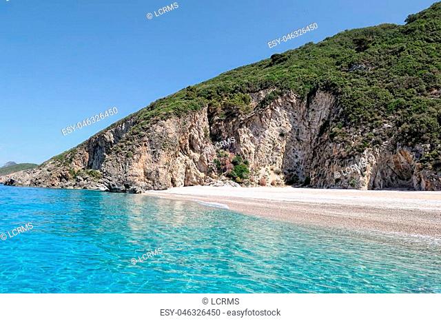 paradise beach of Liapades at Corfu Island (Greece). Sedimentary rock cliff of chalk rocks and crystal clear water