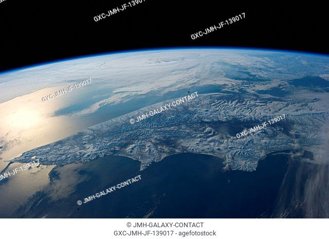 As the International Space Station passed over the Bering Sea on Earth Day, one of the Expedition 39 crew members aboard the orbital outpost shot this panoramic...