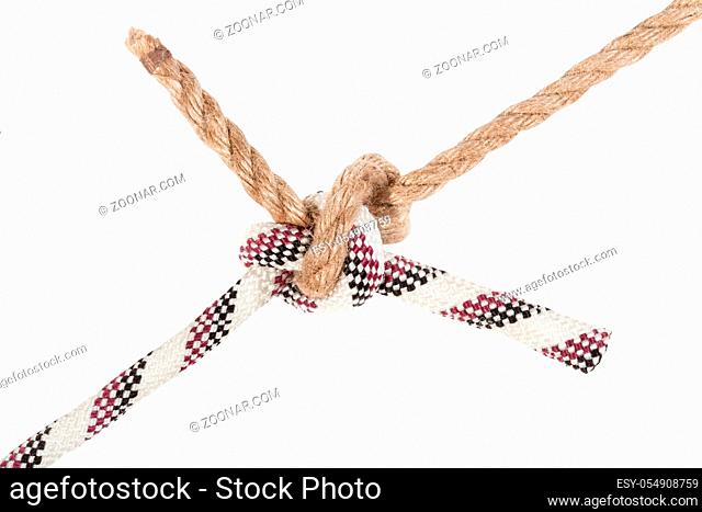 rigger's bend knot joining two ropes close up isolated on white background