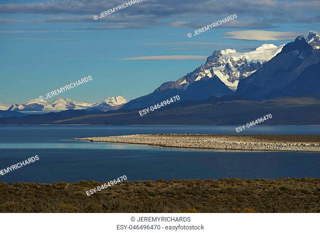 Mountain peaks of Cuernos del Paine rising above the southern end of Lago Grey in Torres del Paine National Park in Patagonia, Chile
