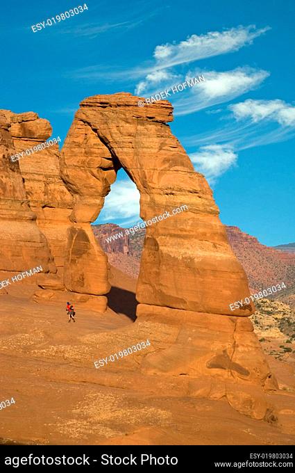 Hiker At Delicate Arch