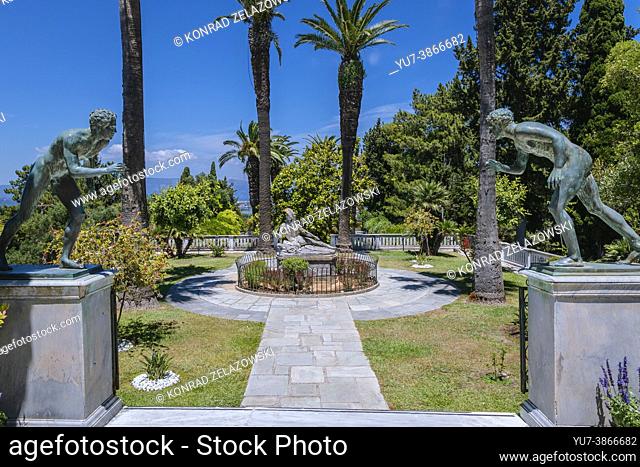 Gardens of Achilleion palace built in Gastouri on the Island of Corfu, Greece for the Empress Elisabeth of Austria - view with Dying Achilles statue