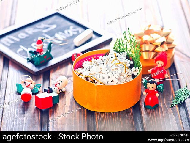 christmas decoration in the golden box and on a table