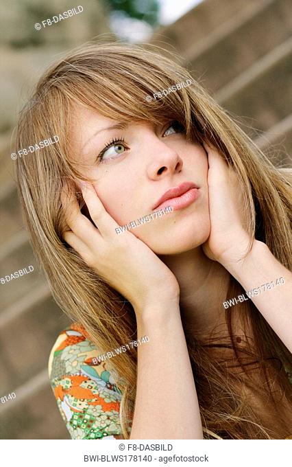 cute young woman with light brown hair