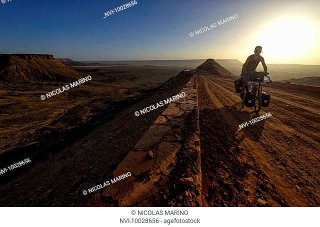 Cycling in the Adrar region of the Sahara desert, Mauritania