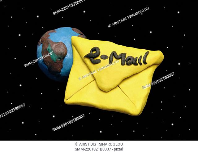 Email envelope traveling in night sky