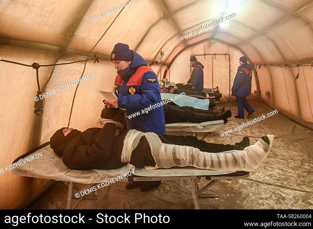 RUSSIA, KRASNOYARSK REGION - APRIL 6, 2023: Rescuers accommodate at an airport in Norilsk for the Safe Arctic exercise held by the Russian Emergency Situations...