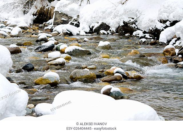 Snow-covered mountain river