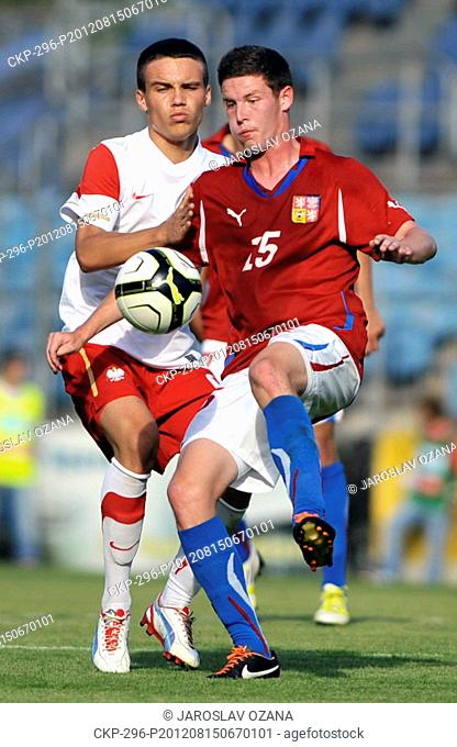 Friendly soccer match Czech Republic 'U20' vs Poland 'U20' in Opava, Czech Republic on August 15, 2012 From left: Szymon Drewniak POL and Patrik Lacha CZE CTK...