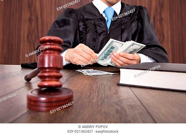 Judge Counting Money