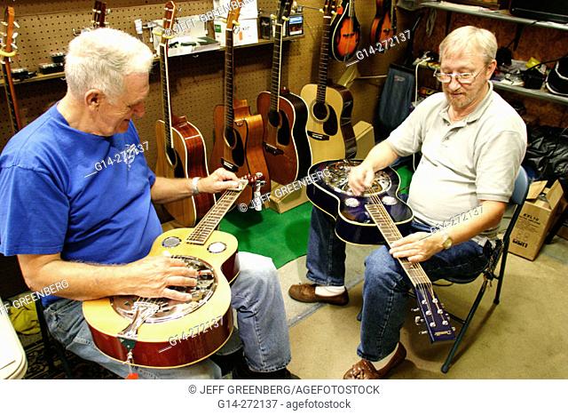 Dobro guitar vendors. Crafts fair and flea market. Smoky Mountains. Sevierville. Tennessee. USA