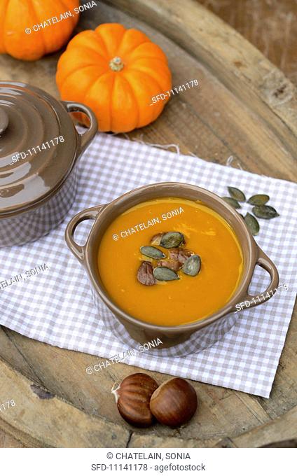 Pumpkin soup with chestnuts and pumpkin seeds