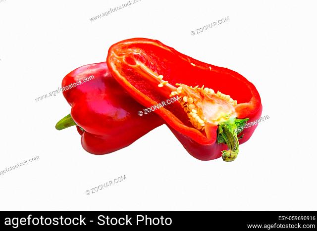 Half of juicy red bell pepper on white background, close-up view