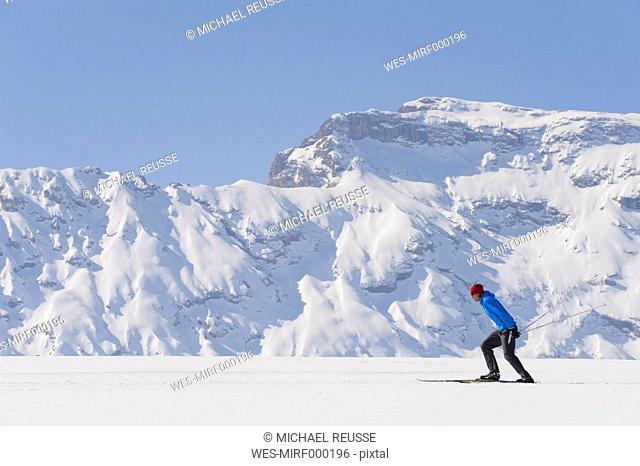 Italy, Trentino-Alto Adige, Alto Adige, Bolzano, Seiser Alm, Mid adult man doing cross-country skiing