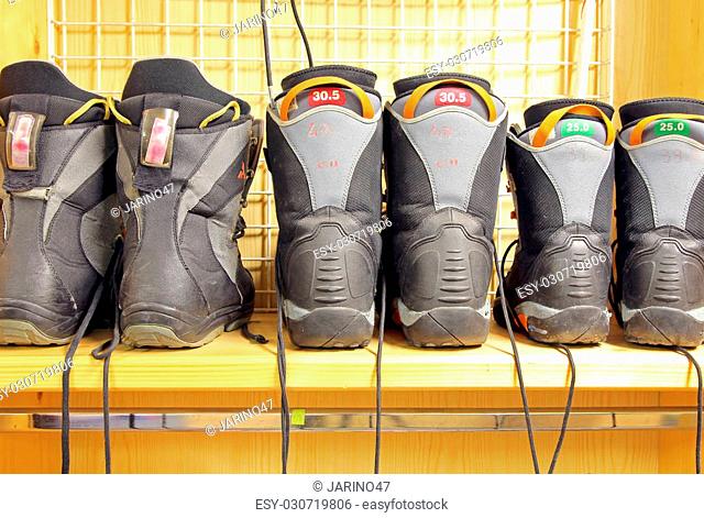 Old snowboard boots at ski rental, Slovakia