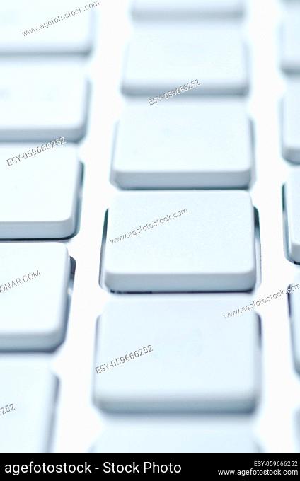 Macro shot of a computer keyboard key with bokeh effect. Selective focus