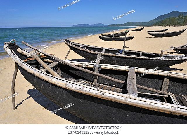 Traditional fishing boats on Vinh Hien beach, near Hue, Vietnam, Southeast Asia