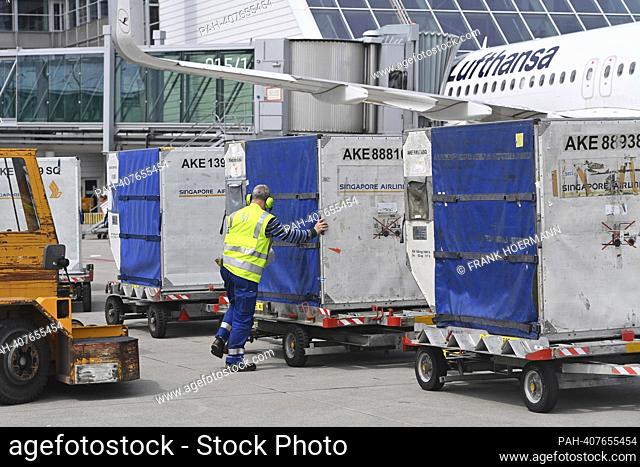 Impressions from Franz Josef Strauss Airport in Munich on May 8th, 2023. Clearance, Air Freight, Freight before loading, groundpersonal