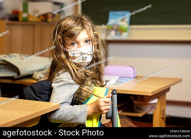 ATTENTION EDITORS: EDITORIAL USE ONLY IN THE CONTEXT OF THE COVID-19 PANDEMIC SAFETY MEASURES ..This staged picture shows a six-year-old demonstrating the...