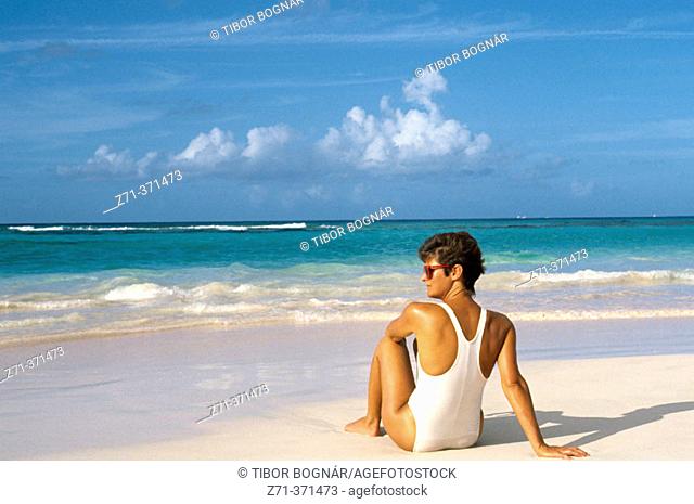 Woman on beach. Barbados, Caribbean