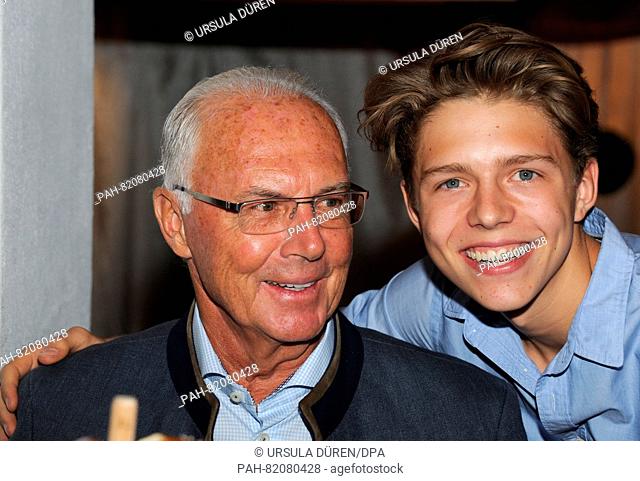 Franz Beckenbauer and his son Joel pose at the get-together of the Bavarian evening in the context of the 29th Kaiser Cup golf tournament of the...