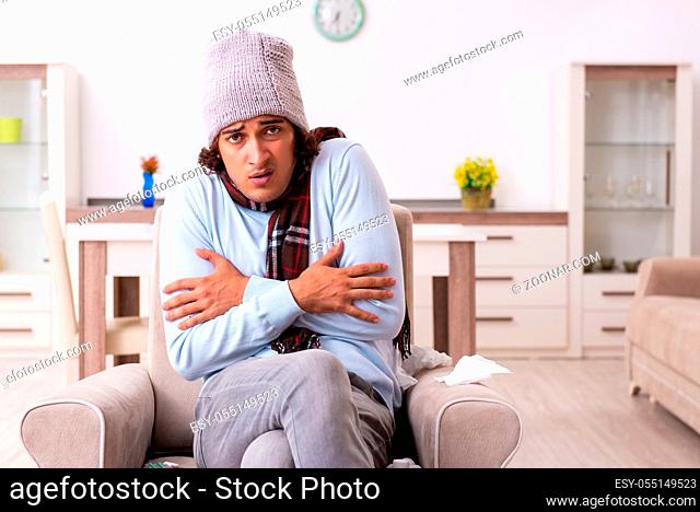 Young man suffering from flu at the home