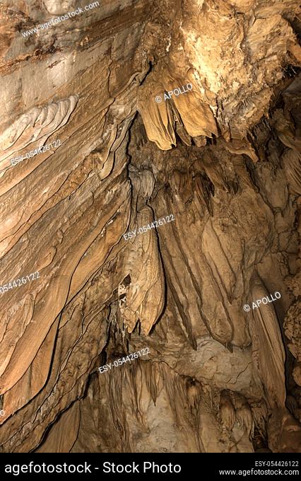 Amazingly shaped calcite deposits, speleothems, created by drippling water at the cave wall, Lang Cave, Gunung Mulu National Park, Sarawak, Borneo, Malaysia