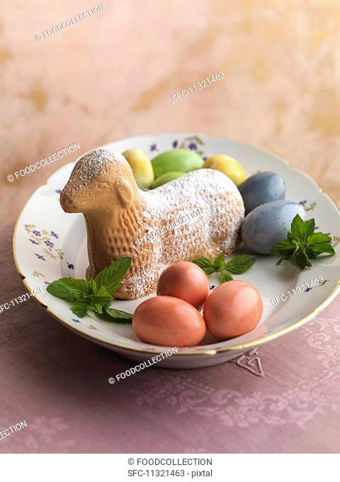 An Easter lamb with colourful eggs