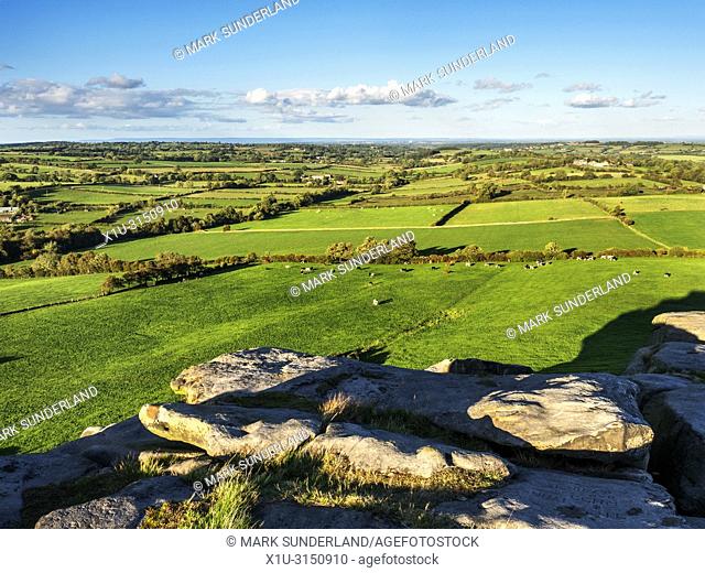 Meadows in the Lower Wharfe Valley from Almscliff Crag millstone grit outcrop near Harrogate North Yorkshire England