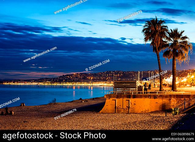 France, city of Nice on French Riviera in the evening, beach and Promenade des Anglais along Mediterranean Sea