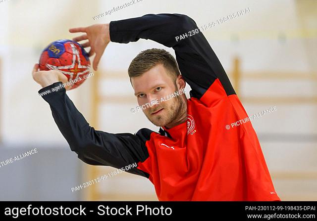 12 January 2023, Poland, Kattowitz: Handball: World Cup in Poland. German player Philipp Weber takes part in a training session