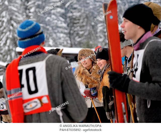Participants dressed in old-fashioned clothes take part in a 'Nostalski' skiing session in Kruen, Germany, 07 January 2017