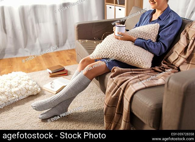 woman drinking hot chocolate at home
