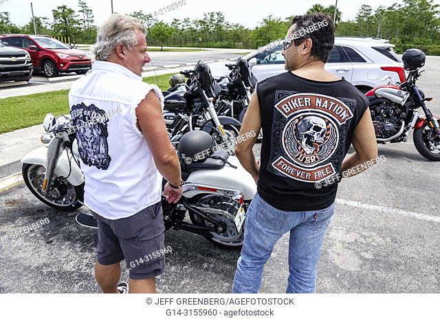 Florida, Everglades, Big Cypress National Preserve, man, friends, motorcycle club members, patches, motorcycles, Oasis Visitor Center centre