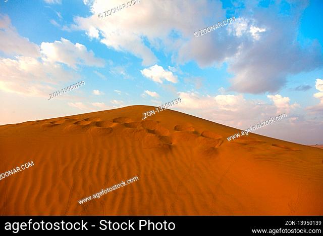Picturesque colorful sunset in the desert. Indian deserts. Horizon in the desert