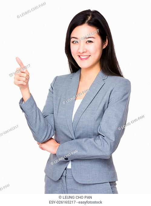 Businesswoman showing thumb up