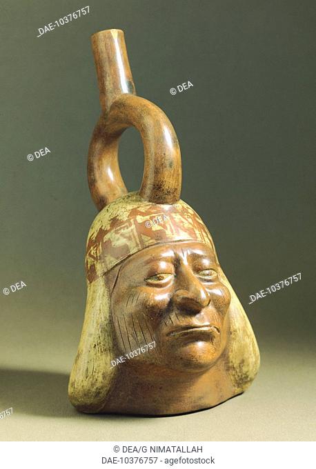 Portrait vase with stirrup handle, artifact originating from Peru. Pre-Inca Mochica Civilization, 4th-9th Century.  Rome