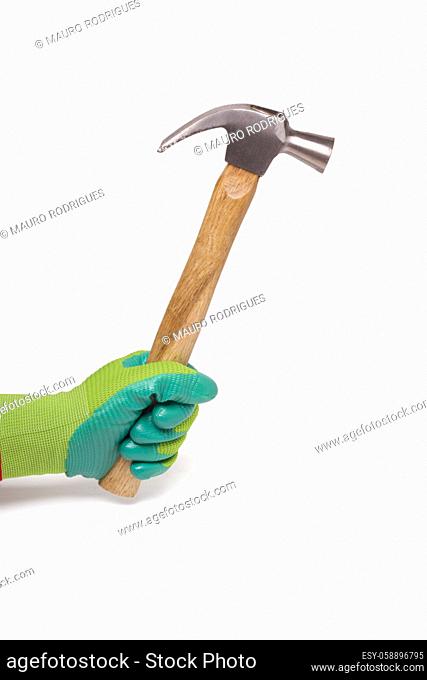 Close up view of a hand with hammer isolated on a white background