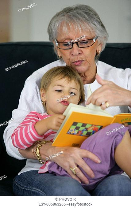Grandma and child reading together