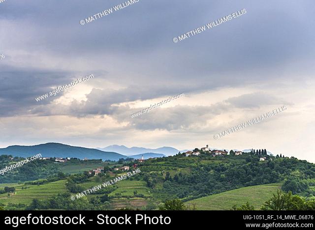 Vineyards in Goriska Brda, showing Chiesa di San Floriano del Collio and the hill top town of Gornje Cerovo, Goriska Brda, Slovenia, Europe