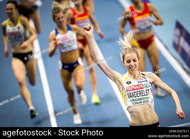 Belgian Elise Vanderelst celebrates as she crosses the finish line to win the final of the women 1500m race at the European Athletics Indoor Championships