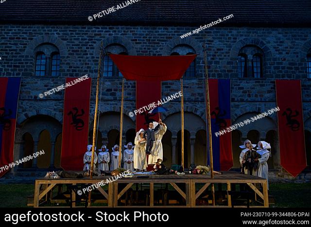 PRODUCTION - 07 July 2023, Saxony-Anhalt, Magdeburg: Members of the Magdeburg Puppet Theater ensemble rehearse a scene from the play ""The Dragon"" with the...