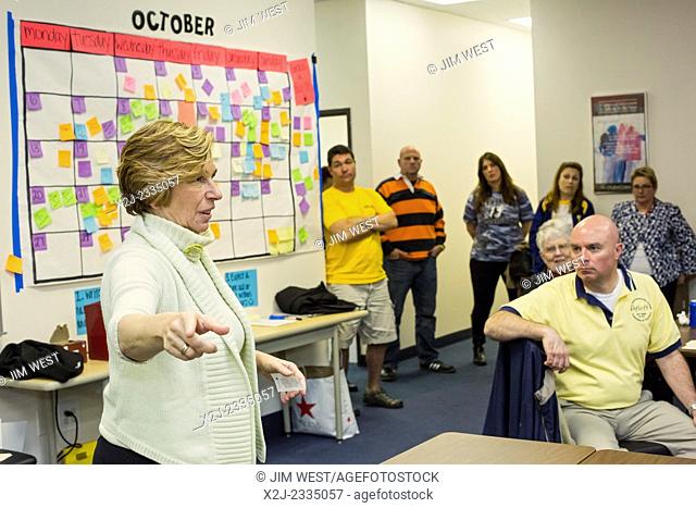 Dearborn, Michigan - Randi Weingarten, president of the American Federation of Teachers, talks to members of her union who have volunteered to canvass their...