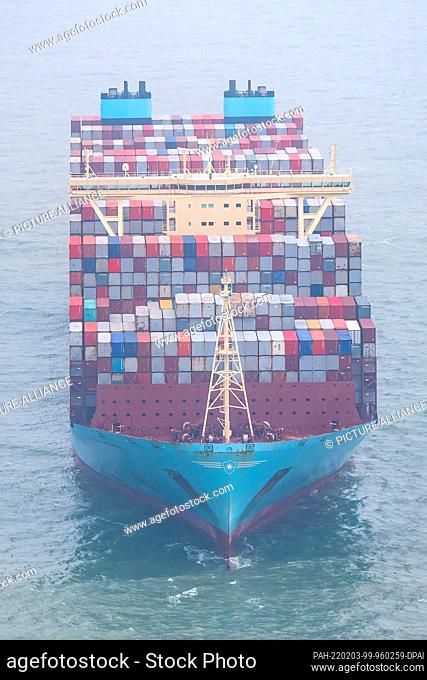 03 February 2022, Lower Saxony, Wangerooge: The ""Mumbai Maersk"" lies in the North Sea. The 400-meter container ship got stuck on Wednesday evening about six...