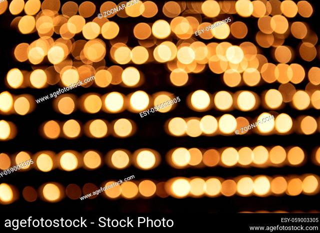 Bokeh lights. Beautiful Christmas background. Gold abstract bokeh background